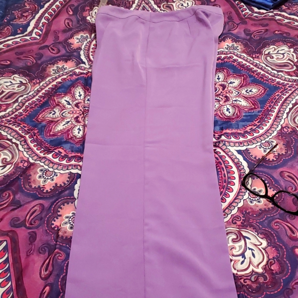 Women pants, material is synthetic and light weight.  Lavender color, ex-long.